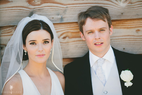 Classic wedding makeup with subtly lined eyes and blush toned lips